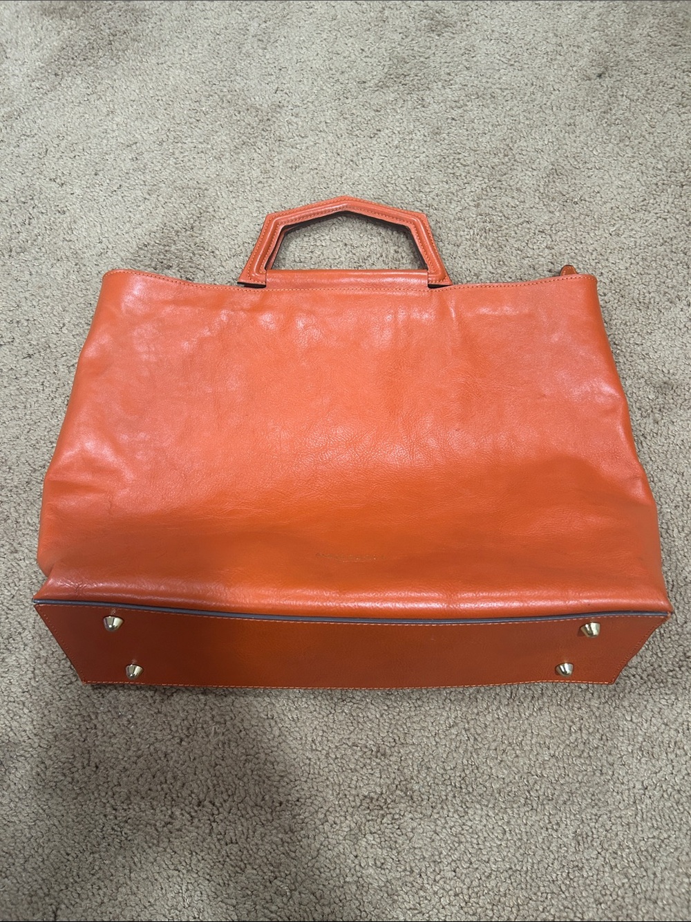 Structured Orange Leather Tote with Geometric Top Handle